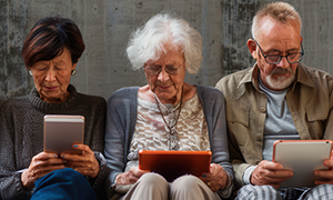 group of seniors on mobile devices